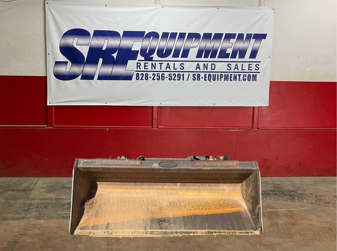 Smooth bucket attachment for a skid steer