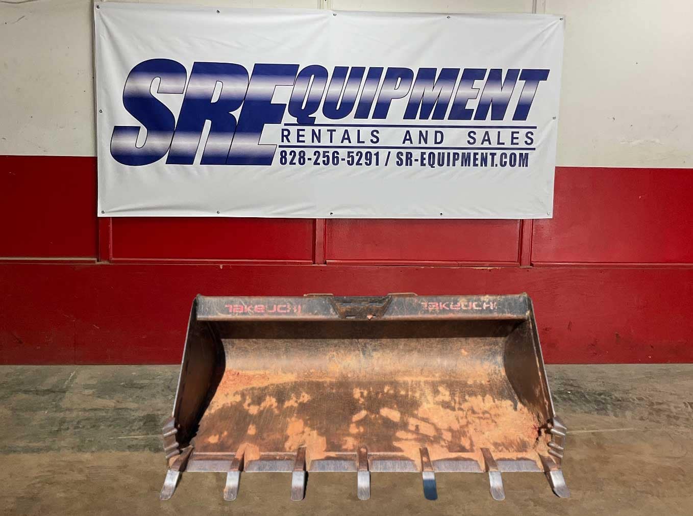 Tooth bucket attachment for a skid steer