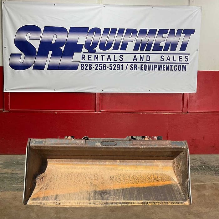 Smooth bucket attachment for a skid steer